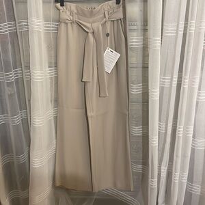 - NWT Maje Stretches to 17 inches the waist fits s/ m see measurements sz T2